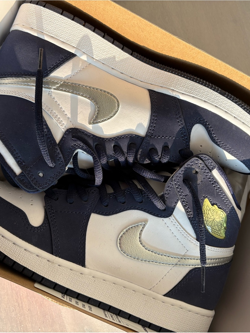 Air Jordan 1 Navy and White Leather Sneakers